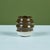 Small studio pottery cup with a ribbed body and two-tone glaze. The upper half and interior is glazed in a glossy olive...