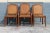 A beautiful set of 6 Carved Walnut Dining Chairs, 2 Arm/ 4 Side Chairs. Stunning flared leg and caned back and seat....