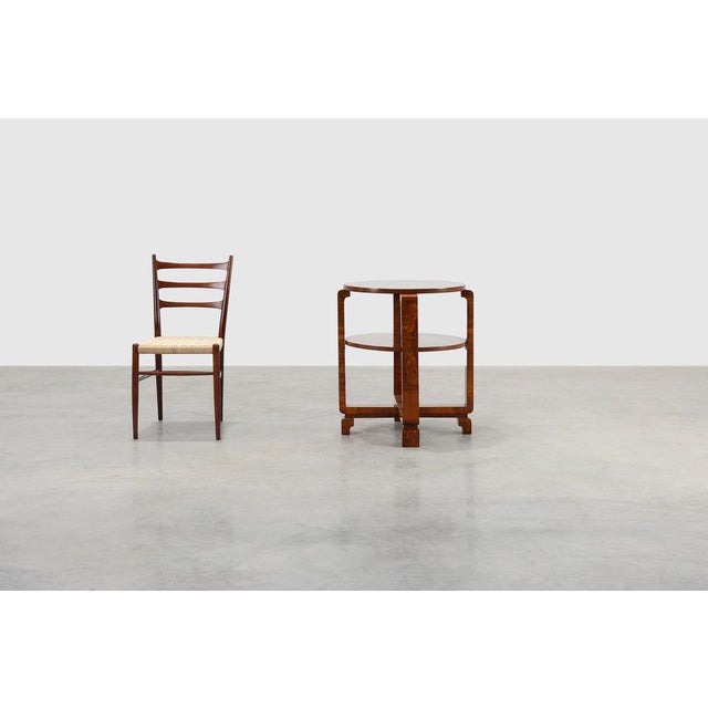 A refined expression of early French Art Deco, this 1920s side or coffee table blends geometric clarity with the warmth of...