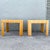 A striking pair of vintage boho chic side tables crafted in split bamboo with sculptural waterfall-style construction....