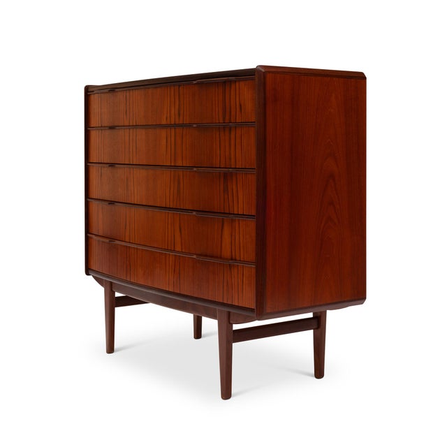 This exquisite vintage Danish Mid-Century Modern five-drawer rosewood tallboy, crafted in Denmark during the 1960s,...