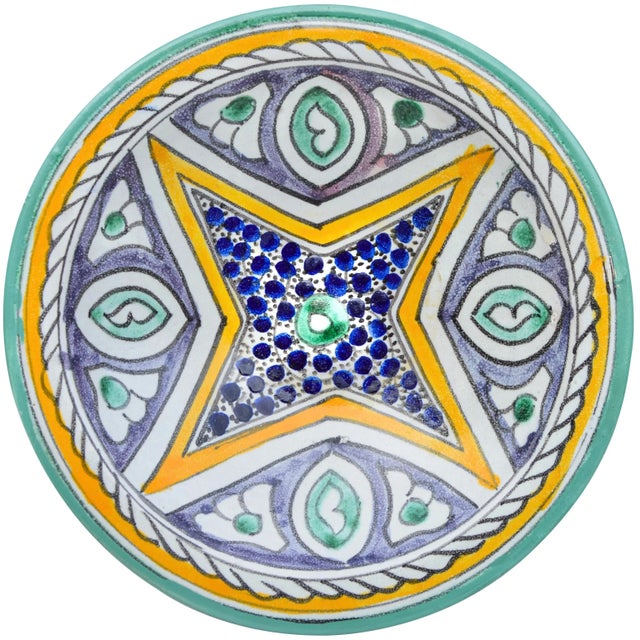 Meticulously handcrafted and glazed featuring an intricate hand-painted Andalusian motif with jazzy color combination...