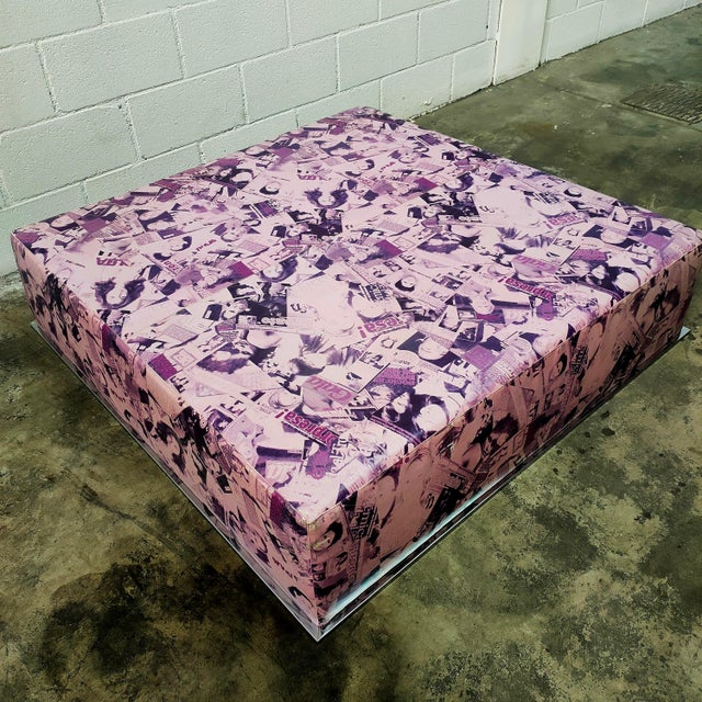Sofa, pouf, coffee table, made of faux leather with vintage celebrity magazine covers. Dimensions: 115x115cm, height 30cm.