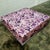Sofa, pouf, coffee table, made of faux leather with vintage celebrity magazine covers. Dimensions: 115x115cm, height 30cm.