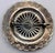 A handsome traditional Southwestern concho-style pin with a scalloped edge, radiating repose, and stamped design....