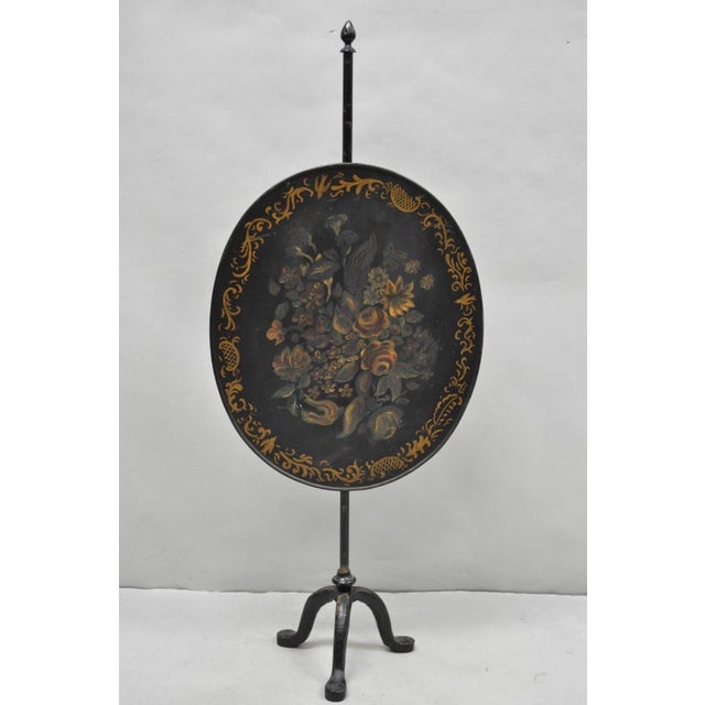 Antique French Victorian Tole Metal Hand Painted Floral Adjustable Height Fireplace Fire Screen. Circa Late 19th Century....