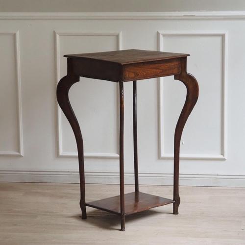 A small side table in Baroque style, crafted around 1900 in the style of the 18th century. The strongly curved legs and...