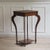 A small side table in Baroque style, crafted around 1900 in the style of the 18th century. The strongly curved legs and...