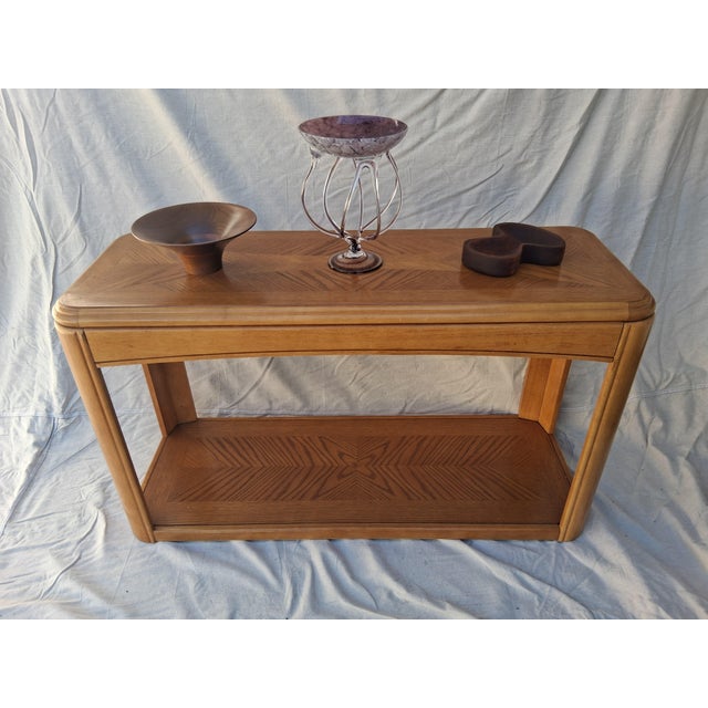 Beautifully veneered & solid Oak Postmodern Console Table from the late 80's - early 90's. Has two tiers for displaying &...