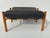 Mid Century Modern style safari footrest / bench in dark charcoal leather