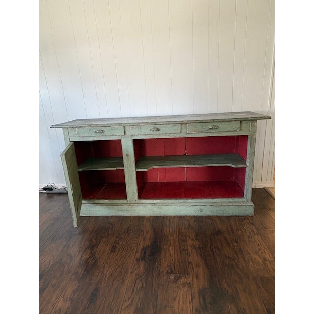 A genuine 19th-century French provincial enfilade with a wood top clad in sheet zinc — a construction likely originally...