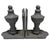 Cast iron grey bookends showcase a traditional aesthetic with intentional antiquing, and paint chips that exude vintage...