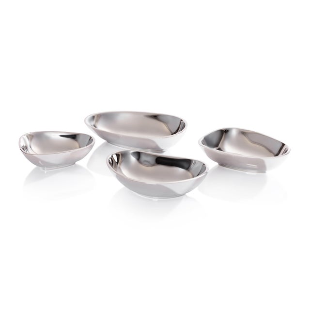 Add a touch of artistry to your table with the Charm Condiment Bowls, a 4-piece set featuring uniquely shaped bowls with a...