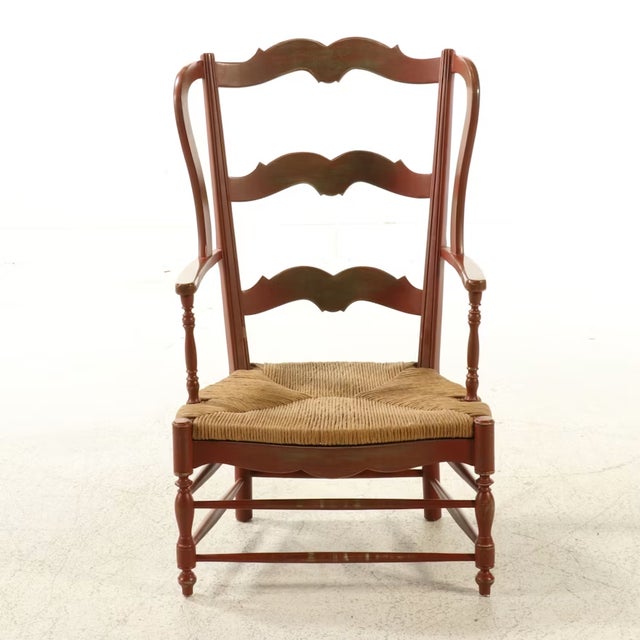 A classic testament to country elegance, this vintage French Provincial style ladder-back wingback armchair brings warmth,...