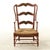 A classic testament to country elegance, this vintage French Provincial style ladder-back wingback armchair brings warmth,...