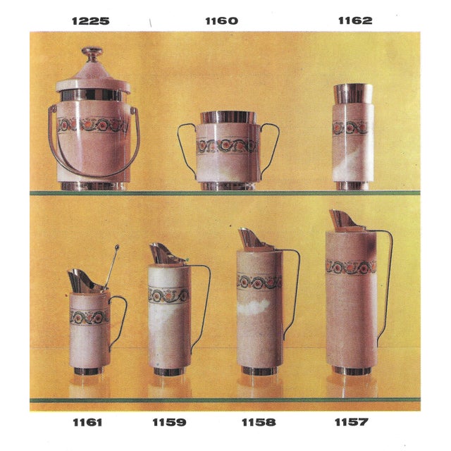Overview an elegant thermos designed by aldo tura and produced in italy during the 1960s, featuring a tall cylindrical...