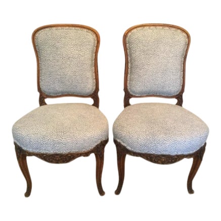 Antique Carved 19th Century French Walnut Side Chairs With Blue and White Animal Print- a Pair For Sale