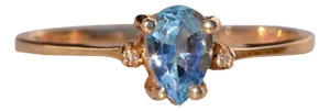 The Tint: Pear Shaped Swiss Blue Topaz and Natural Diamond Ring in Yellow Gold