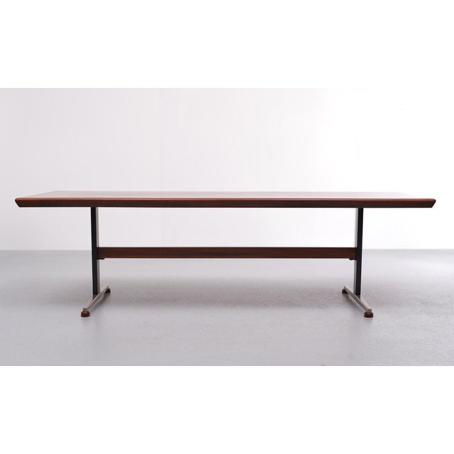 Superb wooden coffee table. Never seen a coffee table after over 50 years and looking so good. Nice details, look at the...