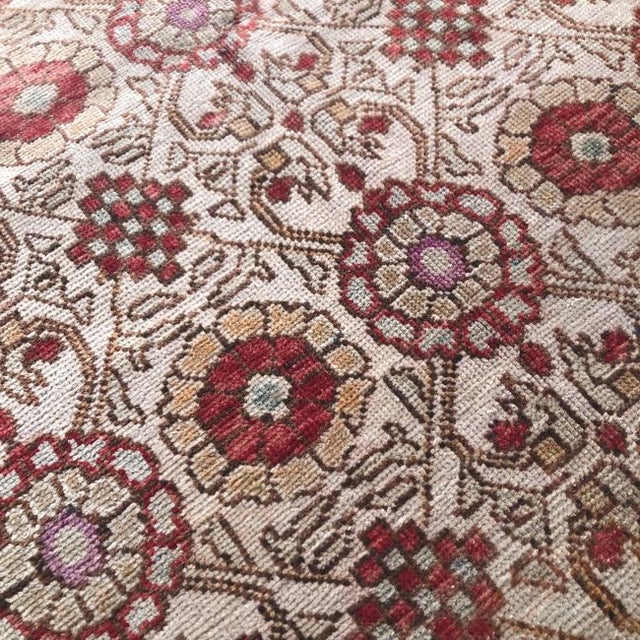 A beautifully detailed vintage rug from the Cappadocia region of Central Anatolia, celebrated for its expressive color...