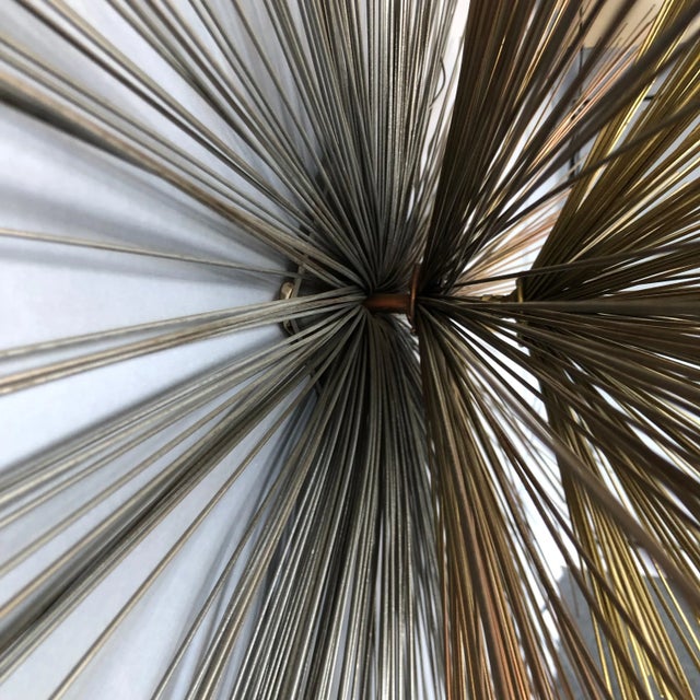 Tri-color metal sculpture by Curtis Jere.