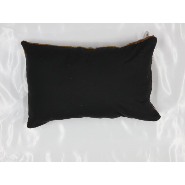 Pillow with antique Persian Bakhshaish rug fragment. Age related wear.