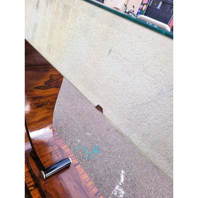 Beautiful Art Deco style store console with wood veneer and beveled mirrors Good overall condition, some wear and...