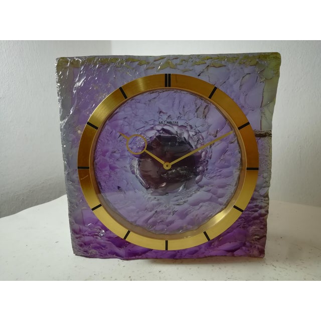Beautiful Jaeger-LeCoultre table clock in purple resin. Automatic oscillating movement with eight-day power reserve....