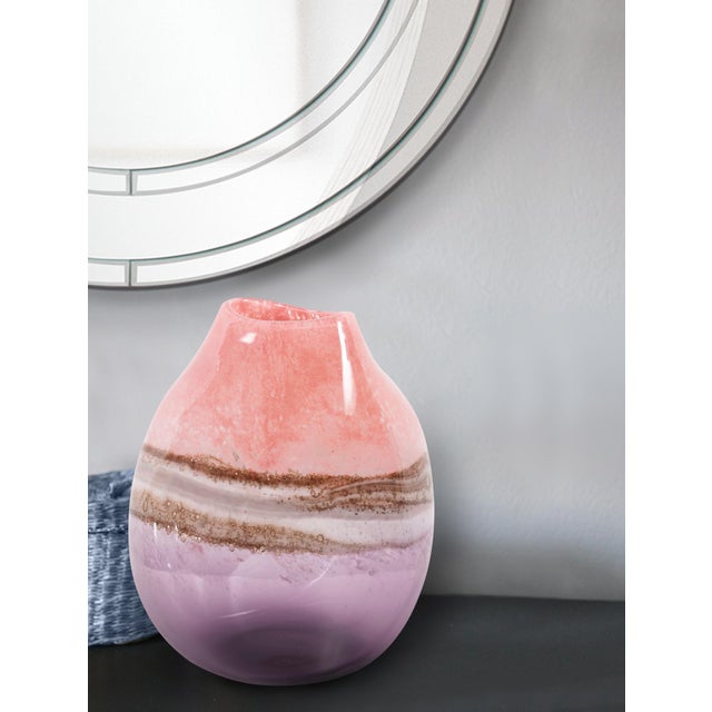 Every detail of The Elsa Vase reflects the passion and creativity of the artisans who breathe life into molten glass. The...