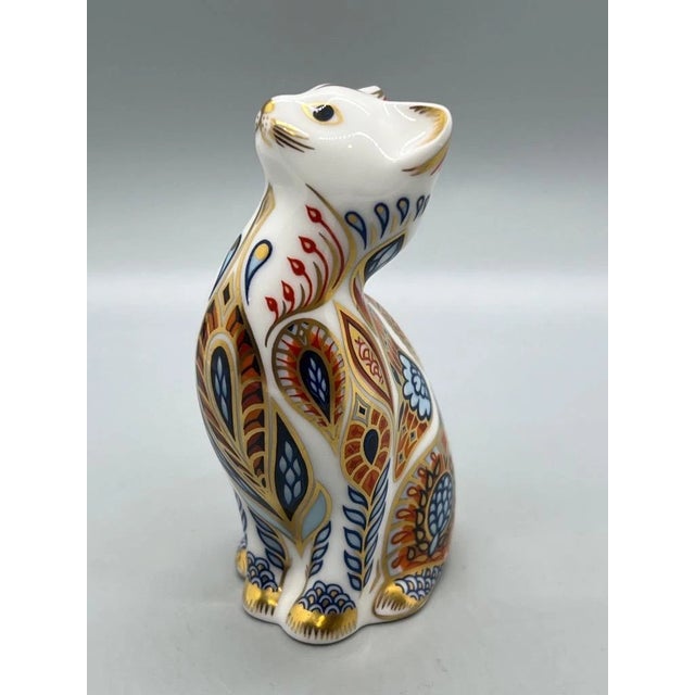 Elegant and charming, this **Vintage Royal Crown Derby Siamese Kitten Imari Paperweight Figurine** showcases the...