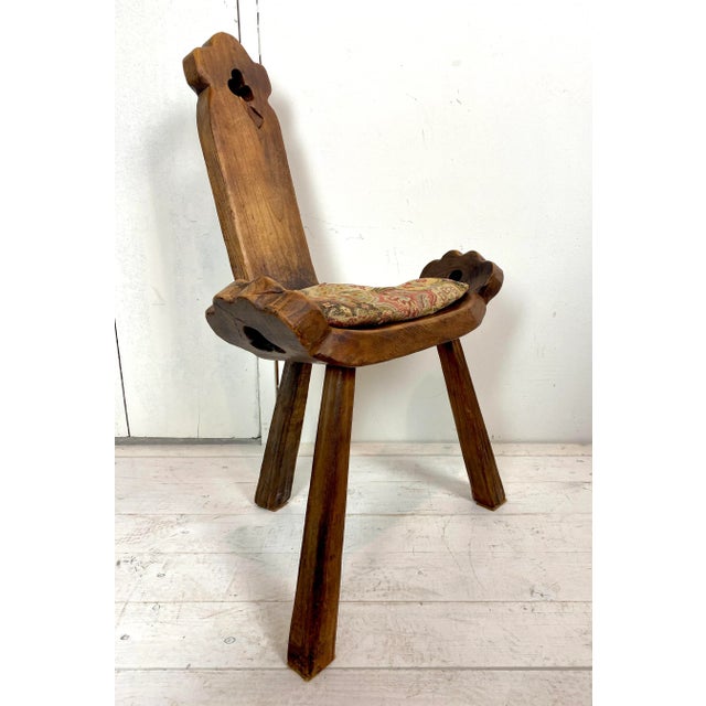 Nice authentic tripod wooden chair, handcrafted, with a naturel brutalist appearance.