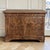 A beautifully crafted 19th century French Louis Philippe commode, distinguished by richly figured walnut and the warm...