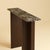 The Maha is an Emperador Dark marble and oak console table, a slim, upright table made to sit against a wall. Stone and...