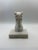 A handsome sculptural horse head bookend carved from natural white stone and set on a substantial rectangular base....