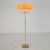 A floor lamp by Malmo metal product company, Sweden, circa 1950. Brass and glass. Shade not included. Existing European...