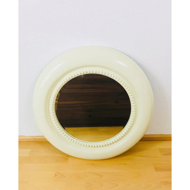 Extraordinary wall mirror made in the US in the 1970s.