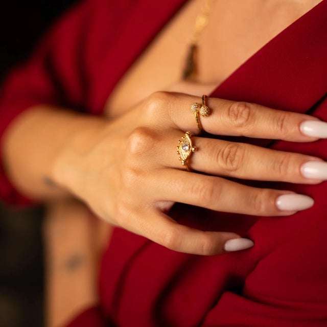 The Eternal Eye Gold Adjustable Ring is a powerful symbol of protection and inner clarity. Featuring the iconic Evil Eye...