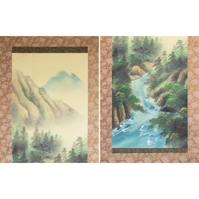 Large antique Japanese silk scroll painting depicts summer landscape with river, mountains and pine trees. Signed and...