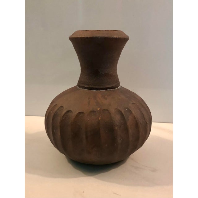 This fabulous Vintage Fluted Terra Cotta Bud Vase will be just the right amount of rustic character your interior decor...