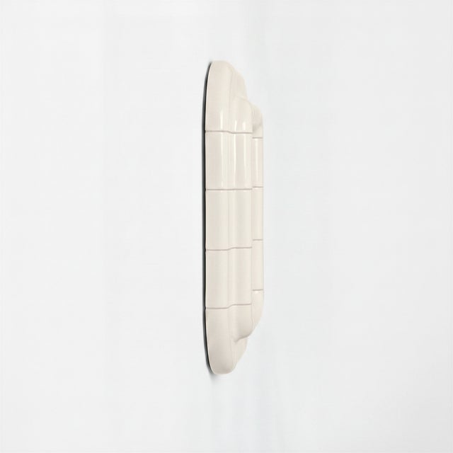 Defined by an enveloping, architectural form, Lolita brings instant presence to a space. Its rounded structure feels both...