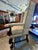 Newly reupholstered pair of William & Mary style high-backed base chairs. Beautiful wood carvings adorn the bottoms of the...