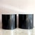 These Postmodern Glass-Top Black Lacquer Cylinder Side Tables offer a sleek, minimalist aesthetic that anchors any...