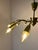 This ten-arm chandelier from the 1950s captivates with its striking spider-like design and is an impressive example of the...