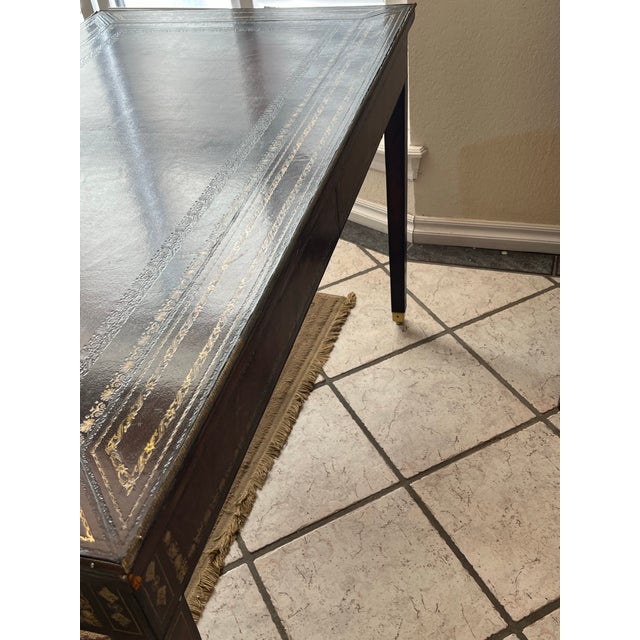 This desk has been handed down for generations. It is Maitland-Smith, a true heirloom. There are many beautiful details in...