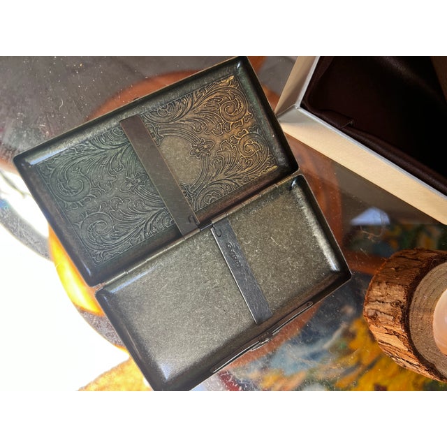 Up for consideration is a beautiful vintage pair of brass etched cigarette cases. These would look lovely in your home,...