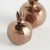 With a rich bronze glaze, uneven texture and organic form, these little pomegranate bud vases are simple and raw. Freshly...