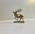 A well made solid brass figurine or small sculpture of a Deer. It certainly has some age to it but otherwise we do not...