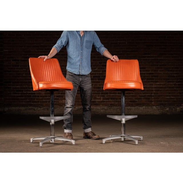 c. 1960s-1970s; Chromcraft Furniture - St. Louis, MO Matching pair of Mid Century Modern swivel bar stools by Chromcraft,...
