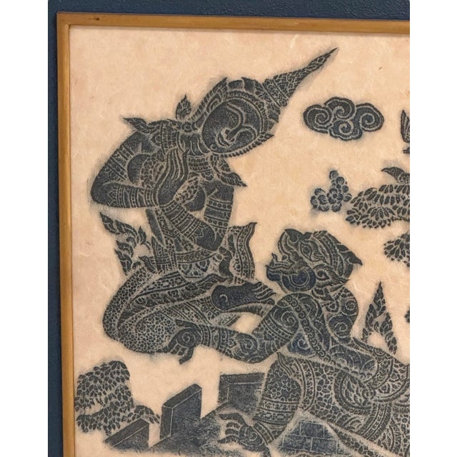 Framed Pair of Thai Blue Temple Rubbings on Rice Paper with Blue Matting This framed pair of Thai blue temple rubbings...