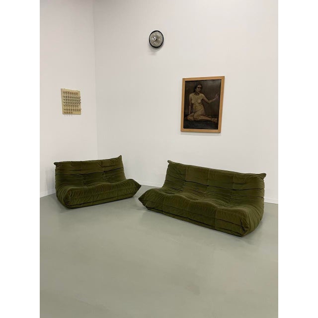 Set composed of two togo benches from ligne roset, absolutely period and original fabric in very bright green velvet....